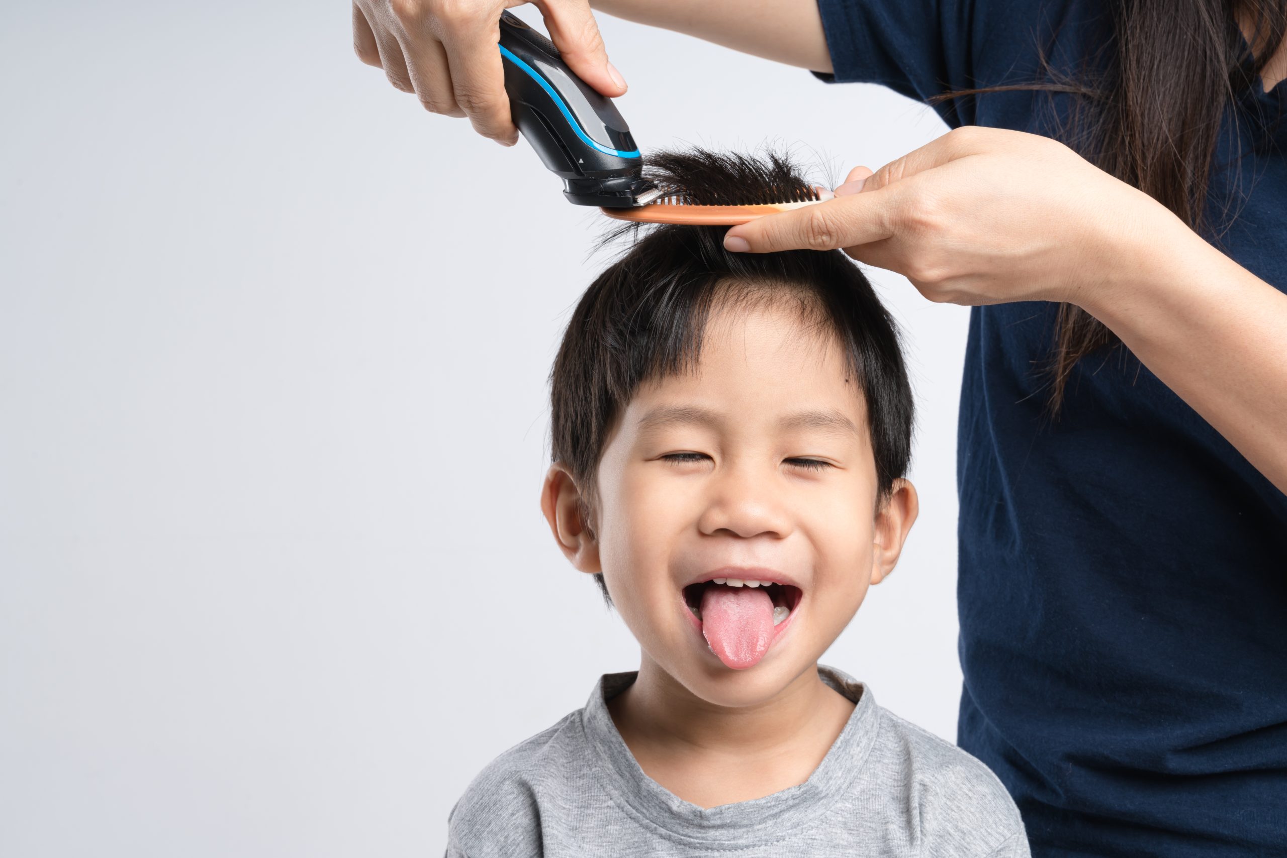 Asian boy got hair cut at home